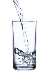 pouring water isolated on a glass on white background