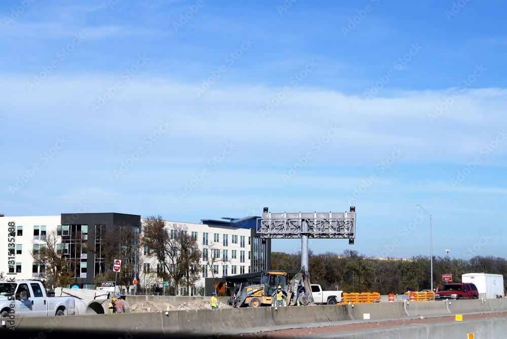 Wall mural construction and a building and the sky