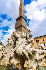 Fototapeta na wymiar Fontana dei Quattro Fiumi at Piazza Navona in Rome, Italy