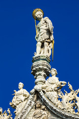 Marble statues on top of the Basilica and Cathedral of San Marco in Venice, Italy