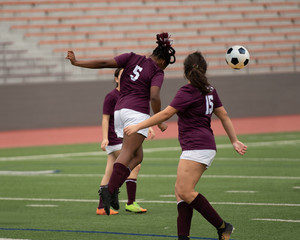 High school girls competing in a soccer match in south Texas