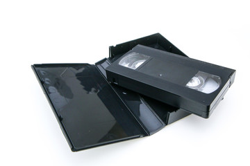 The old retro vhs video cassete with a cover isolated on a white background. 