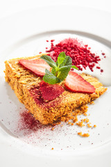 Traditional Russian Honey Cake Medovik on Restaurant Plate Isolated
