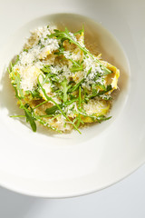 Tortellini with 4 Cheeses on White Restaurant Plate Isolated