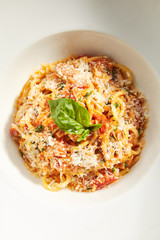 Classical Italian Spaghetti with Tomatoes, Tomato Sauce and Parmesan