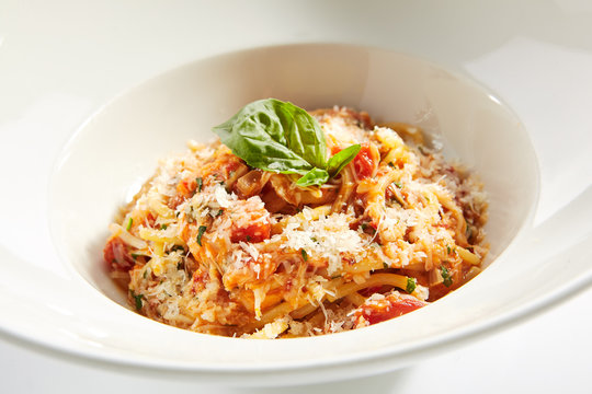 Classical Italian Spaghetti with Tomatoes, Tomato Sauce and Parmesan