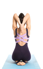 Woman practicing yoga on white background