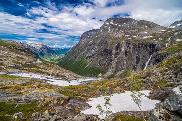 Fototapeta na wymiar TROLLSTIGEN, NORWAY - June, 2019: Trollstigen viewing or viewpoint platform. Trollstigen or Trolls Path is a serpentine mountain road in Rauma Municipality in Norway