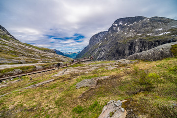 TROLLSTIGEN, NORWAY - June, 2019: Trollstigen viewing or viewpoint platform. Trollstigen or Trolls Path is a serpentine mountain road in Rauma Municipality in Norway