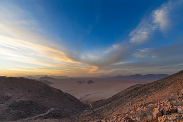 Windswept clouds at sunset in the Namib Desert