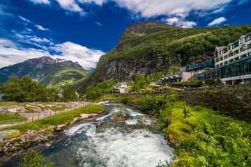 Naklejka na ściany i meble Geiranger fjord, Norway - June,2019: Beautiful Nature Norway 15-kilometre long branch off of the Sunnylvsfjorden, which is a branch off of the Storfjorden