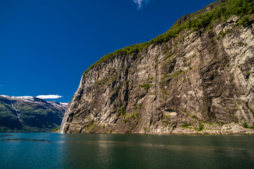 Fototapeta na wymiar The bride waterfall over Geirangerfjord, located near the Geiranger village, Norway