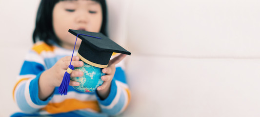 Education study abroad in Global world,Back to School and Graduation cap on student hand holding...