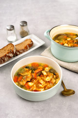 Detox cabbiage soup in a white bowl