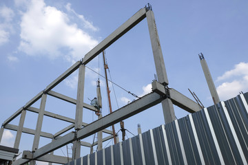 labor man working high pile no safety . Worker risk on top structure home building site.