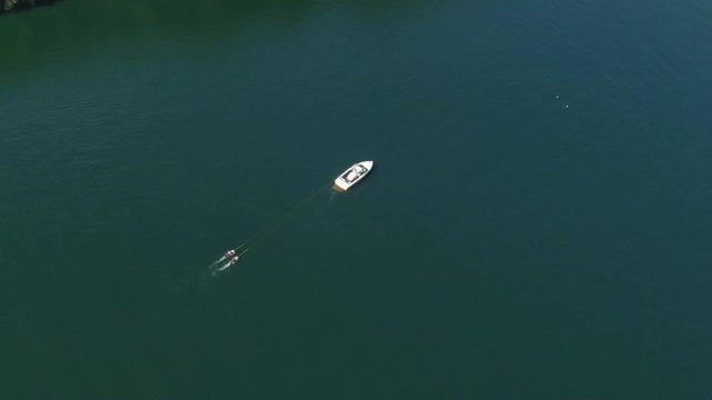 Aerial drone speedboat starting up watersports 