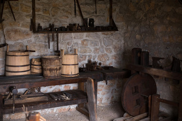 Fototapeta na wymiar Barrel workshop with traditional tools