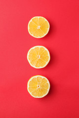 Ripe cut lemon on color background