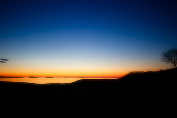 unset from the coast in norway.