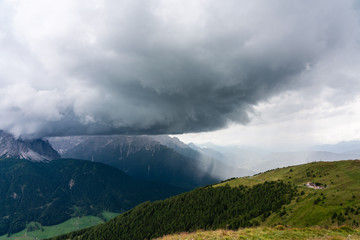 Obraz na płótnie Canvas Stormy clouds over the dolomites, Italy.