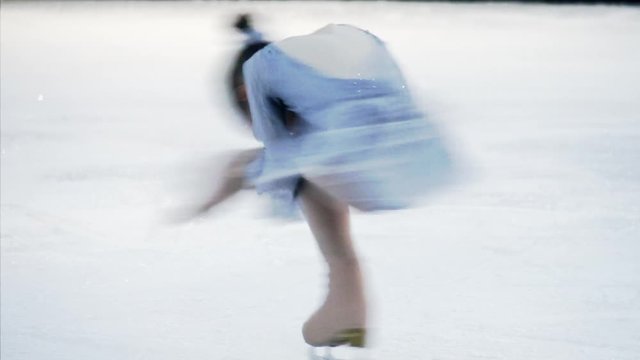Element of Figure Skating. Little girl performs an element of figure skating "Spinner"