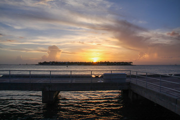 Naklejka na ściany i meble sunset at the pier at key west
