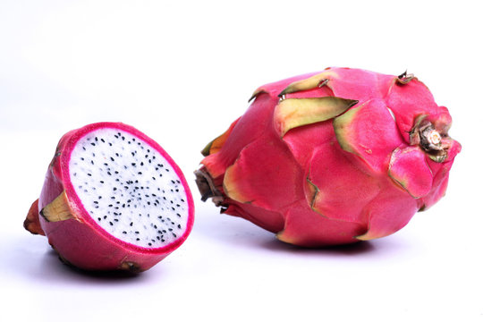 dragonfruit - cut fruit and a whole fruit isolated on white background. Horizontal image