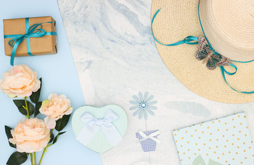 Femininity and girly stylish pastel blue colored accessories and decorations.