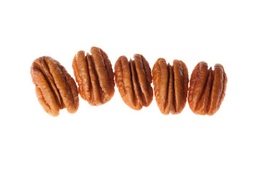 Brown pecan nut isolated on white background. Healthy and diet food.