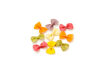 Colored pasta in the shape of bows.