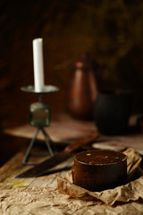 Rustic dinner table with old candlestick