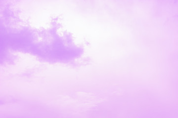 Pale pink violet sky with purple clouds. Sky background, copy space