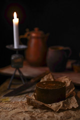 Rustic dinner table with old candlestick