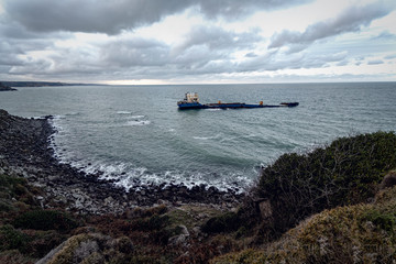 abandoned and sunken ship in sea