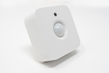 Modern motion and light sensor. For security or home automation purposes.