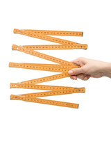 cropped view of woman holding measuring tape isolated on white
