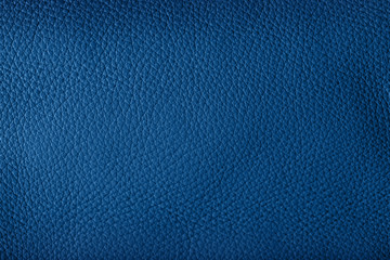 The luxury leather sample is tinted in the trendy  color 2020, classic blue. Abstract background in...