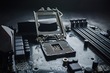 Close-Up of CPU Socket on a Modern Computer Motherboard. Electronic Small Component Details. PC repair or upgrade concept.
