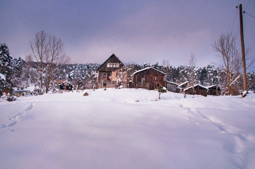 House on a snowy hill, Abant Turkey