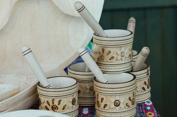 Wooden mortars with pestles isolated, kitchen utensils