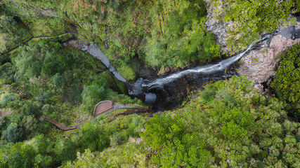 Aerial drone view of "Risco" waterfall and viewpoint in "Paul da Serra", Madeira island, Portugal