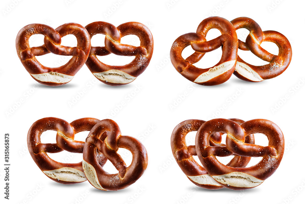 Wall mural Pretzel with salt on a white isolated background