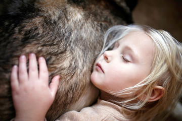 Little Child Napping on Soft Fur of Beloved Family Dog