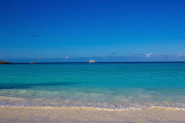 Fototapeta na wymiar The view of beach on Half Moon Cay island at Bahamas.