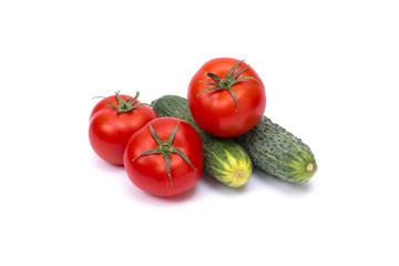 Tomato with cucumber on white background with clipping path. Ripe vegetables isolated on white background. Tomatoes, cucumber on isolated on white background..