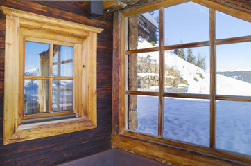 Window in the house with winter background 