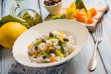 sepia salad with capsicum black olives and basil