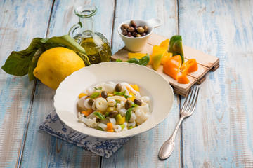 sepia salad with capsicum black olives and basil