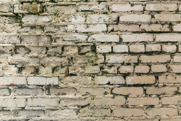 old beige brick textured wall