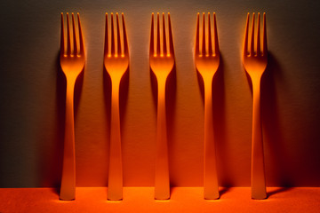 Neon glow - Orange forks in a row